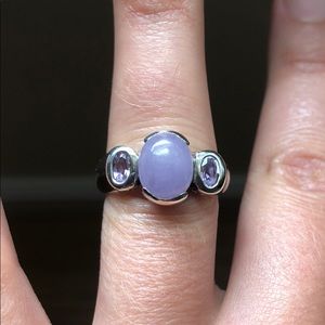 Sterling silver ring with purple stone. 925 stamp